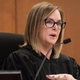 The Hon. Kellie Johnson presides over a hearing in Pima County Superior Court in Tucson, Ariz. on Friday, Aug. 19, 2022.